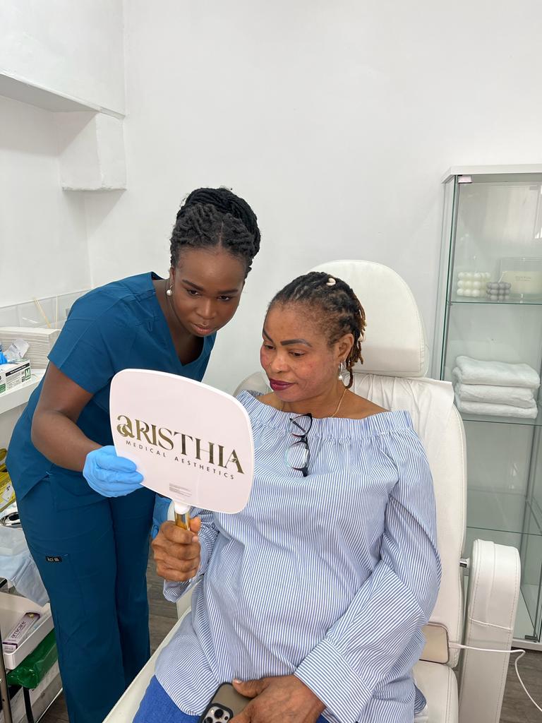 Dr Temi with a client